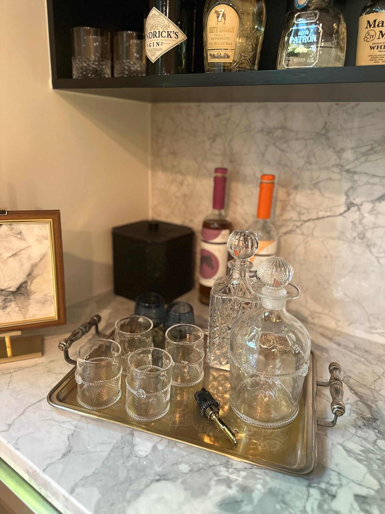 Artful bar vignette with crystal glassware
